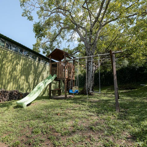 Let the kids loose on the playground in the large garden