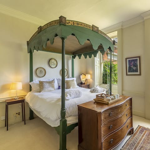 Sleep soundly in the antique four-poster beds