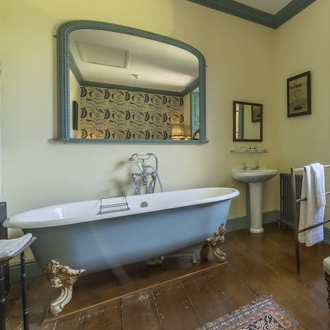 Unwind with a glass of wine in the clawfoot bathtub