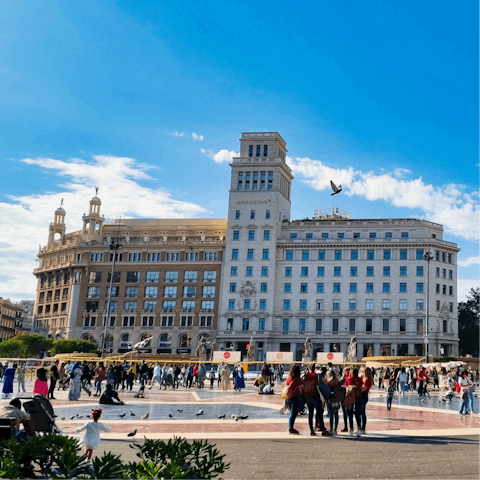 Start your sightseeing in Plaça de Catalunya, a short walk away