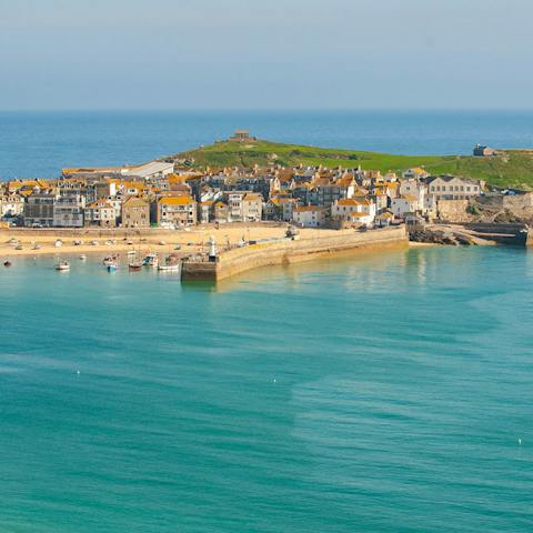 Head to the pretty beach town of St Ives, a mile away