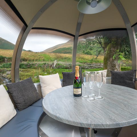 Open a bottle of bubbly and admire the views from the rotating garden pod