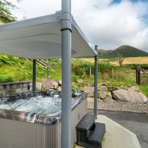 Unwind after a long walk with a sunset soak in the private hot tub