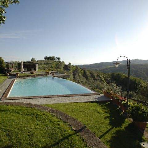 Soak up the magnificent Tuscan hill vistas from the shared swimming pool