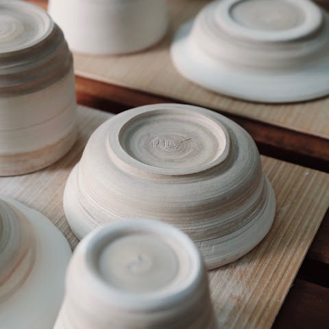 Attend a pottery lesson to immerse yourself in the world of ceramics
