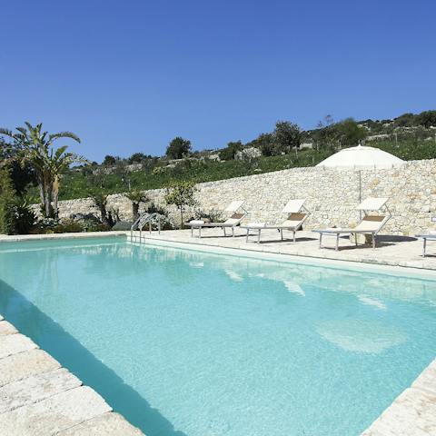 Take a refreshing dip in the private swimming pool 