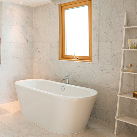 Unwind in the bathtub after a day of water sports activities 