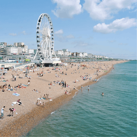 Stroll half an hour along the seafront to reach Brighton's famous beach