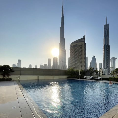 Gaze up at the world's tallest building as you float in the rooftop pool