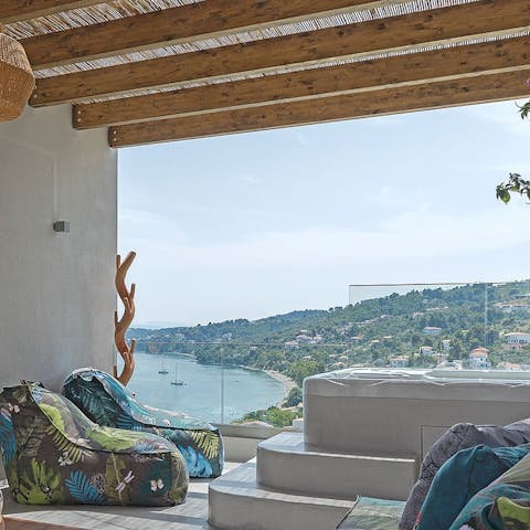 Relax in the jacuzzi and admire views of the coast