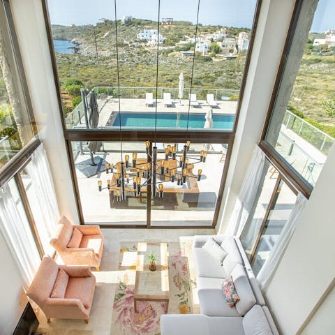 Marvel at the views from this glass-fronted home