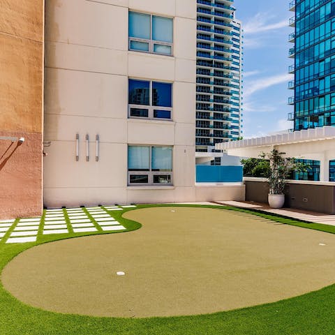 Practice your swing on the rooftop putting green