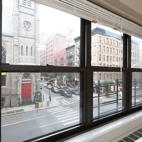 Watch the New York City street scenes from your bedroom window