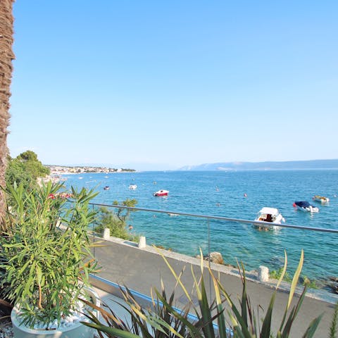 Gaze out at gorgeous views of the island of Krk in the distance
