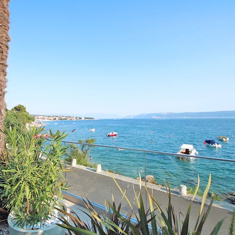 Gaze out at gorgeous views of the island of Krk in the distance