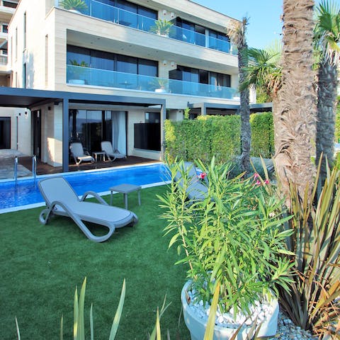 Start the day with a refreshing paddle in the home's swimming pool