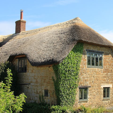 Stay in a picturesque and peaceful 16th century thatched cottage