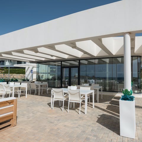Nip over to the resort bar for a late afternoon cocktail, playing a game of cards and soaking up the sea view