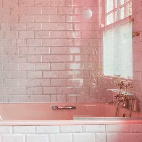 Fill up the pink bathtub with bubbles for a moment of indulgence