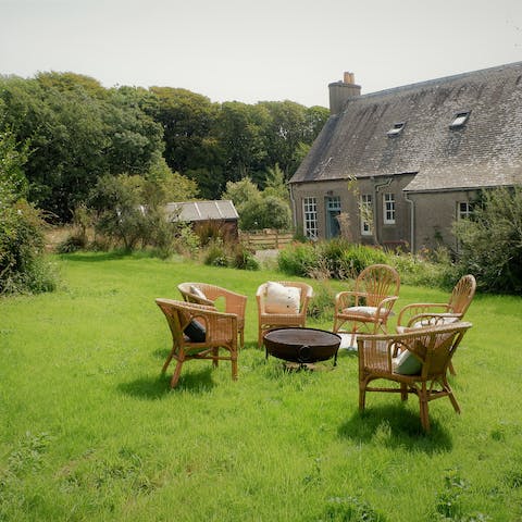 Gather around the firepit on a chilly evening and keep warm