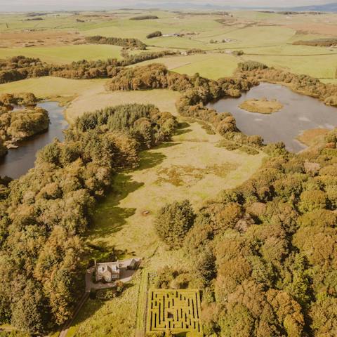 Explore the sprawling estate to find waterfalls, lochs, walled gardens and hedge mazes