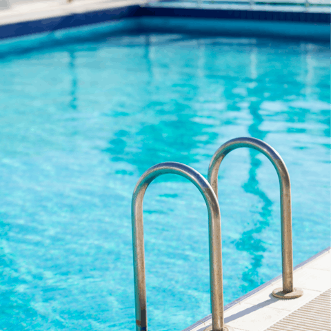 Jump into the communal pool to escape the hot heat