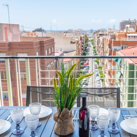 Watch the world go by over a glass of Rioja on the balcony