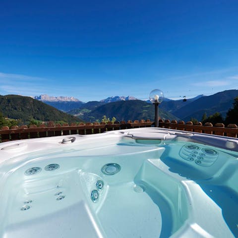 Enjoy impressive views from the toasty hot tub