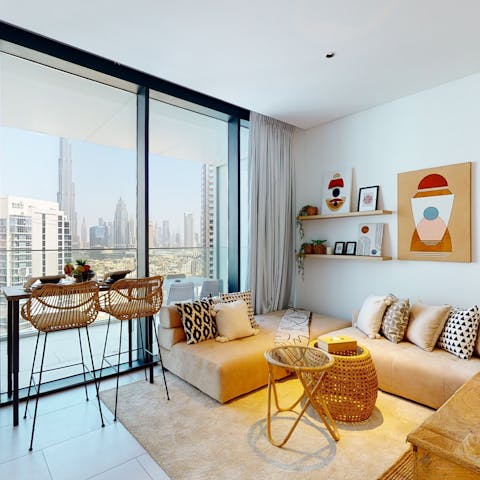 Relax in the stylish living space or enjoy dinner with a view at the table