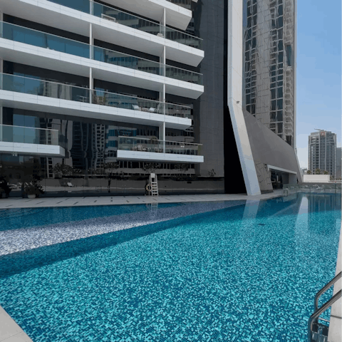 Slip into the communal pool and cool off after a day at the beach