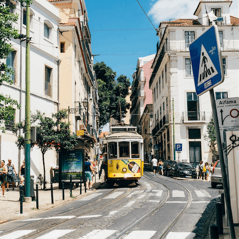 Explore the vibrant and bustling streets of Lisbon from this central apartment