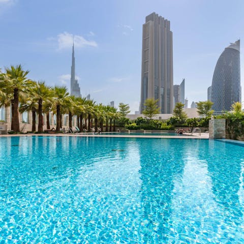 Admire views of the Burj Khalifa while swimming laps in the communal pool
