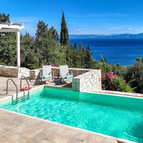 Float in one of the private pools and admire the sea views