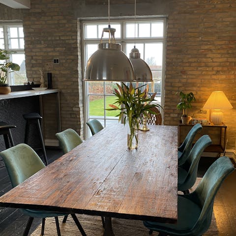 Tuck into a delicious open-faced sandwich at the rustic dining table