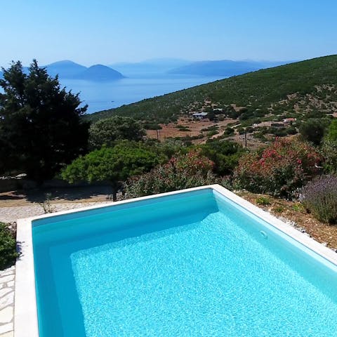 Dive into your crystal-clear pool and take in the incredible views