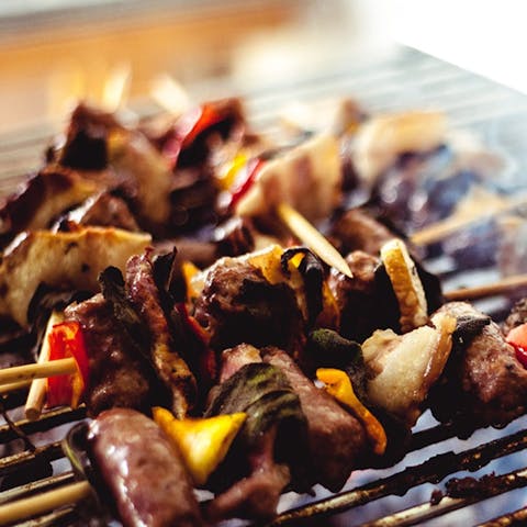 Cook outside on the home's barbecue