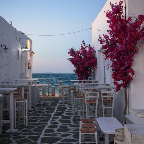 Stroll down the streets of Paros – known for great bars and trendy restaurants