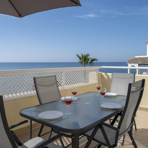Enjoy tapas on the private balcony as you soak up the sea views