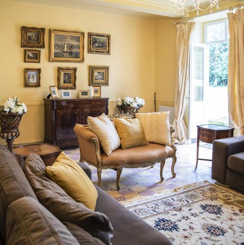 Recline like Louis XIV in this elegant Versailles-inspired sitting room