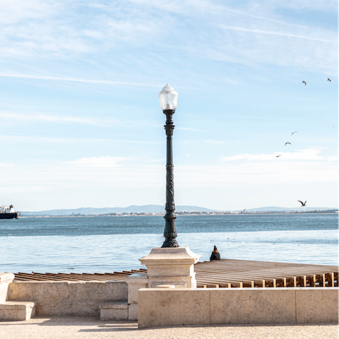 Stroll down to the banks of the River Tagus and enjoy a walk by the water
