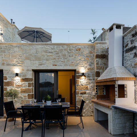 Light your outdoor wood oven and dine alfresco under the stars