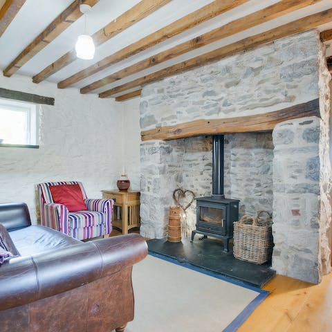 Cosy up around the log burners in the home's two living rooms