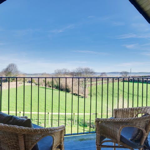 Enjoy the far-reaching views from the master bedroom's balcony