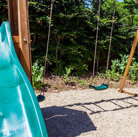 Let the kids have fun in their very own playpark with swings and a zip wire