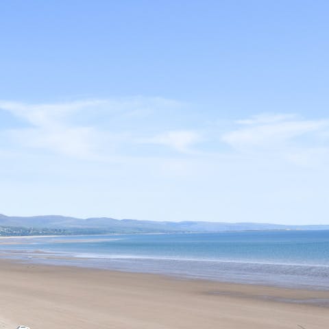 Head to the golden sands of Criccieth Beach,  just a fifteen-minute walk away 