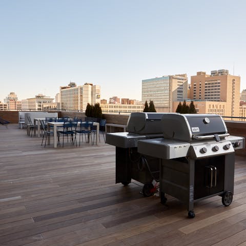 Gather with new friends on the roof terrace for a barbecue