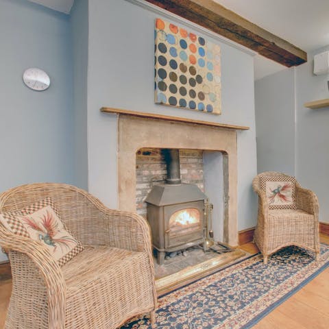 Settle next to the wood burner in the kitchen while food aromas fill the air