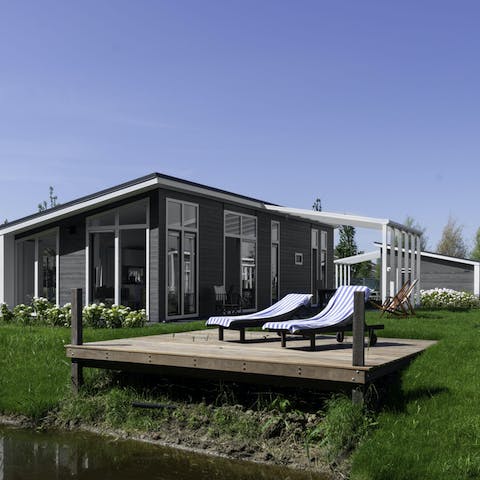 Pour your favourite drink then settle in at the water's edge for a lazy afternoon