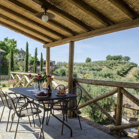 Sample the farmhouse's home produced olive oil with lunch on the private terrace