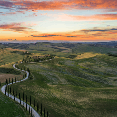Explore the undulating Tuscan countryside
